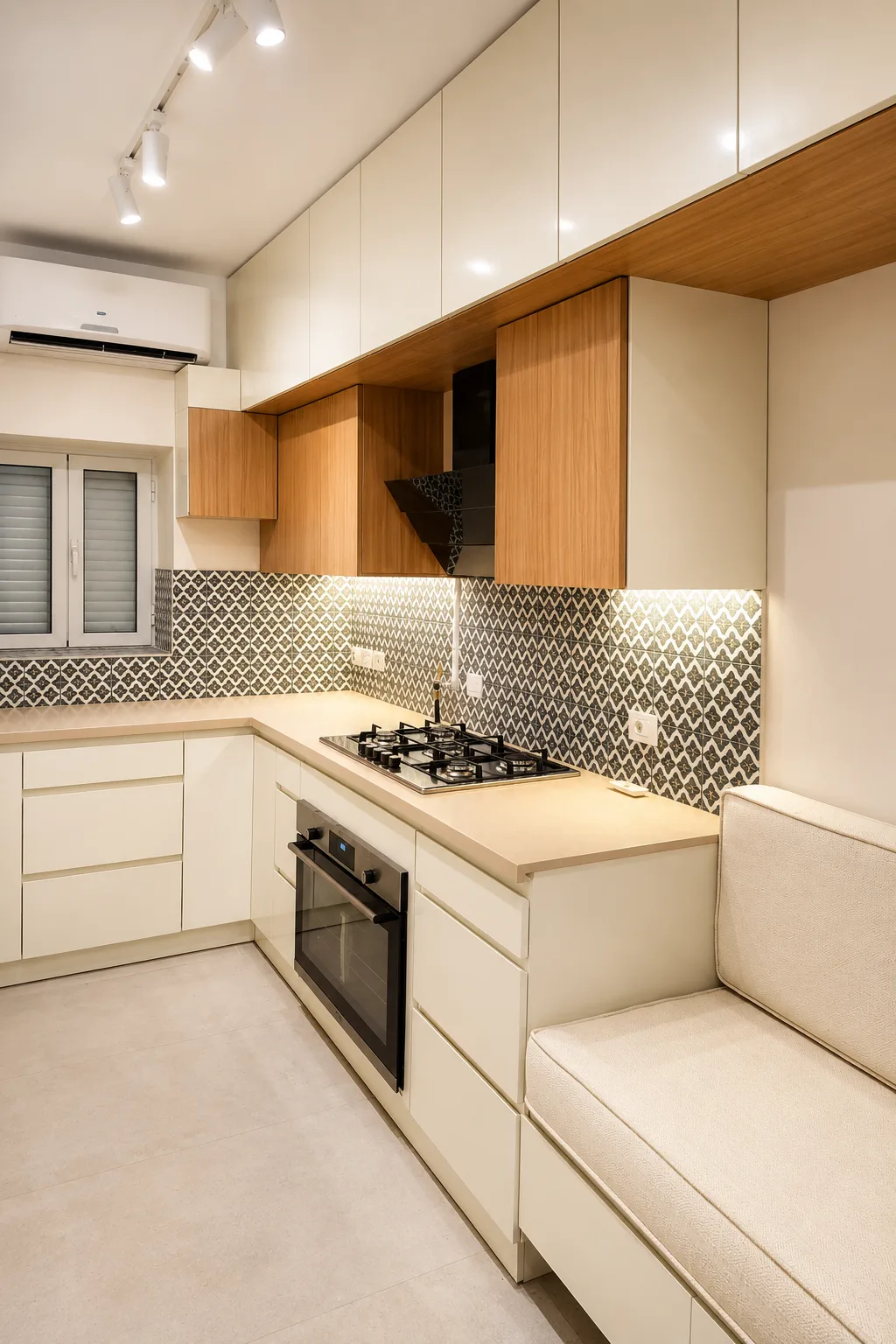 White kitchen with patterned backsplash in the Maadi Villa project in Maadi