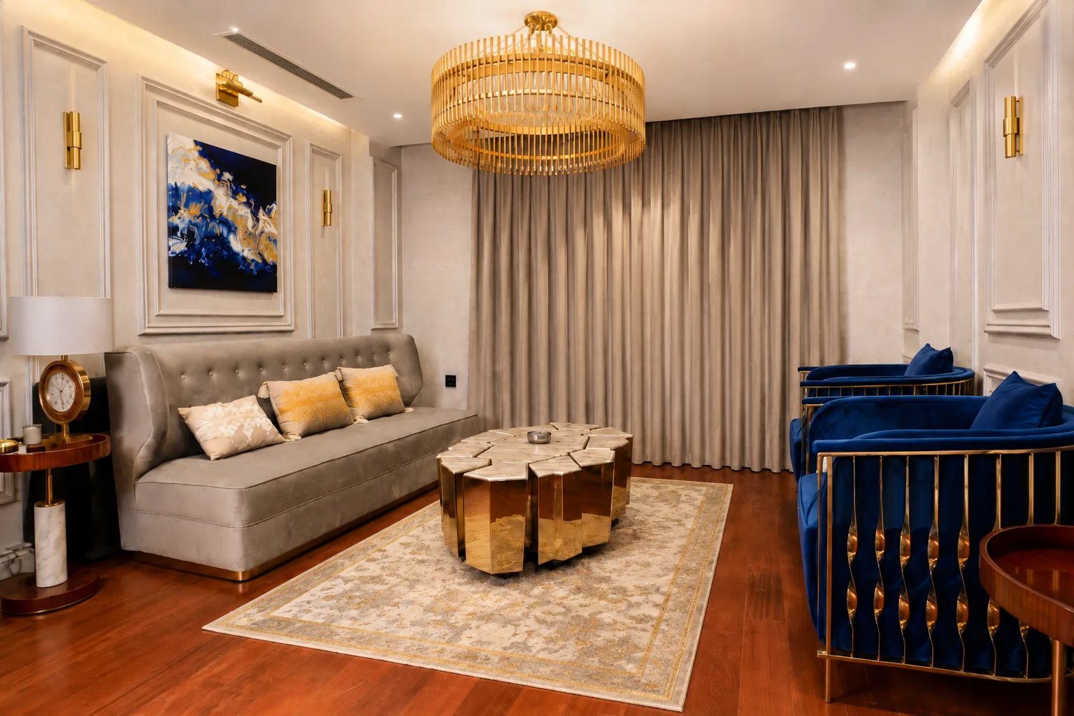 Classic living room with blue chairs in the Mohandseen Apartment project in Mohandseen