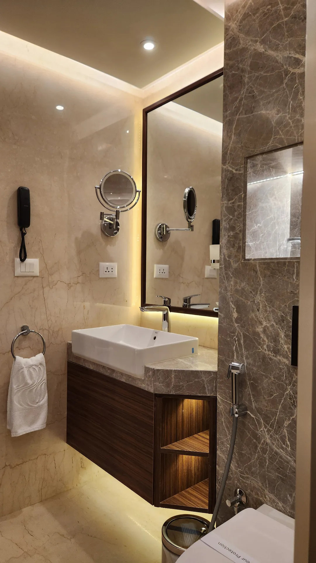 Bathroom sink and mirror in the Sonesta Hotel project in Nasr City