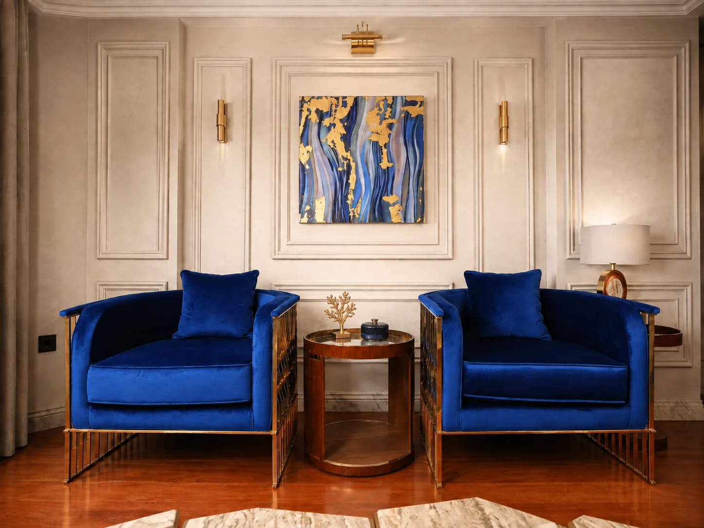 Classic sitting area with blue chairs in the Mohandseen Apartment project in Mohandseen